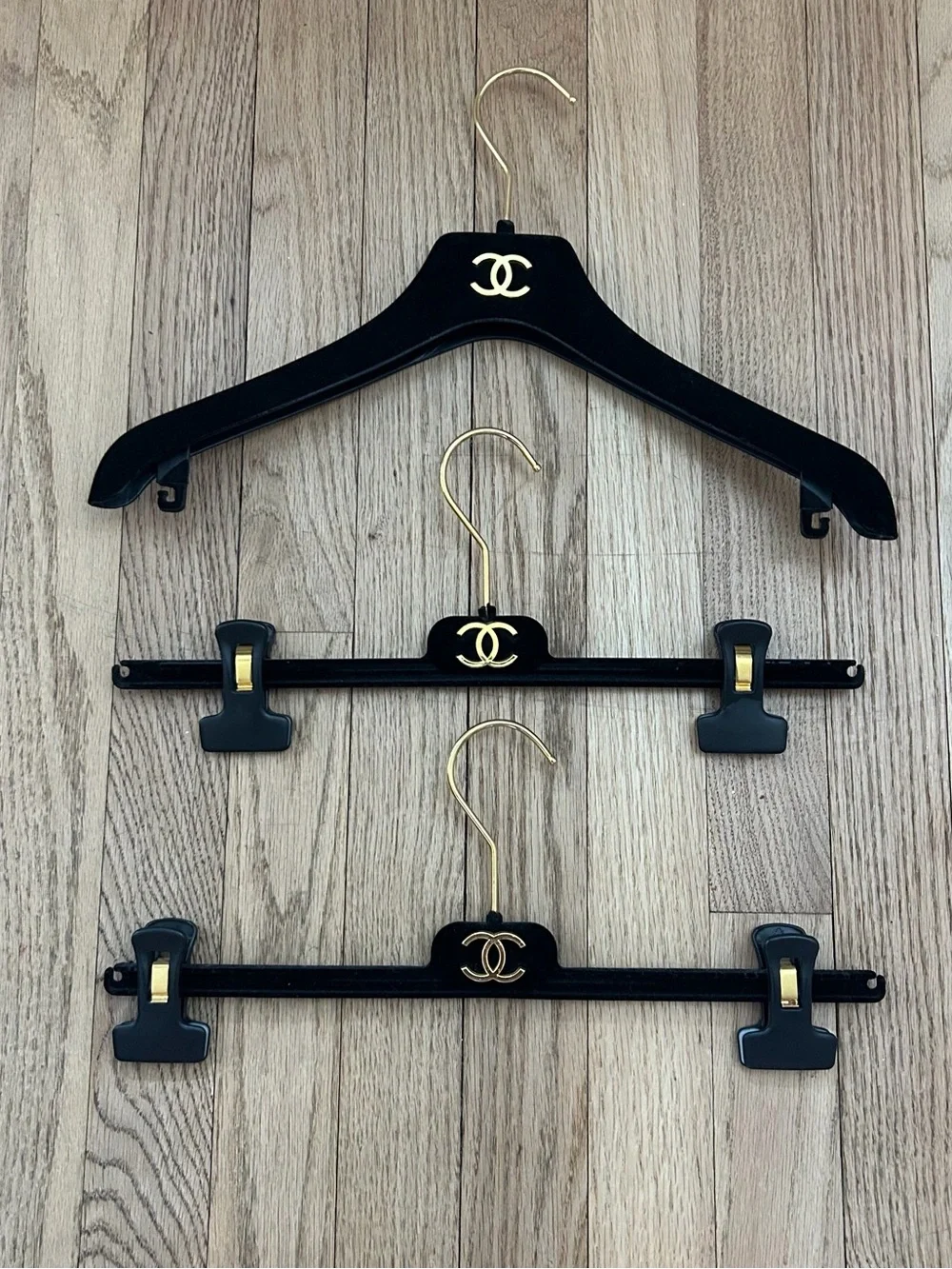 CHANEL Black and Gold Velvet Logo Hanger Trio